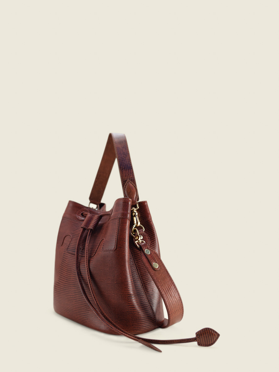 foto-vista-lateral-bolso-cubo-cuero-rojo-capucine-1960-paul-marius-w39-l-r