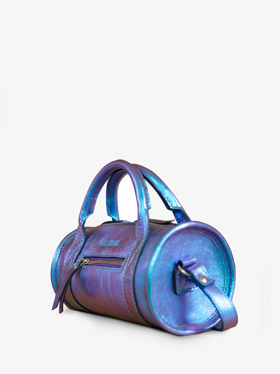 foto-vista-lateral-bolso-de-mano-de-cuero-azul-iridiscente-mujer-charlie-scarabee-paul-marius-w30-p-blu