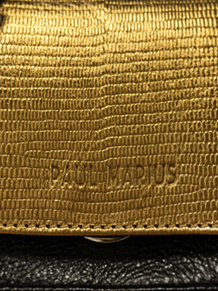 foto-en-primer-plano-material-bolso-bandolera-cuero-dorado-negro-diane-xs-or-noir-paul-marius-w35xs-l-g-b